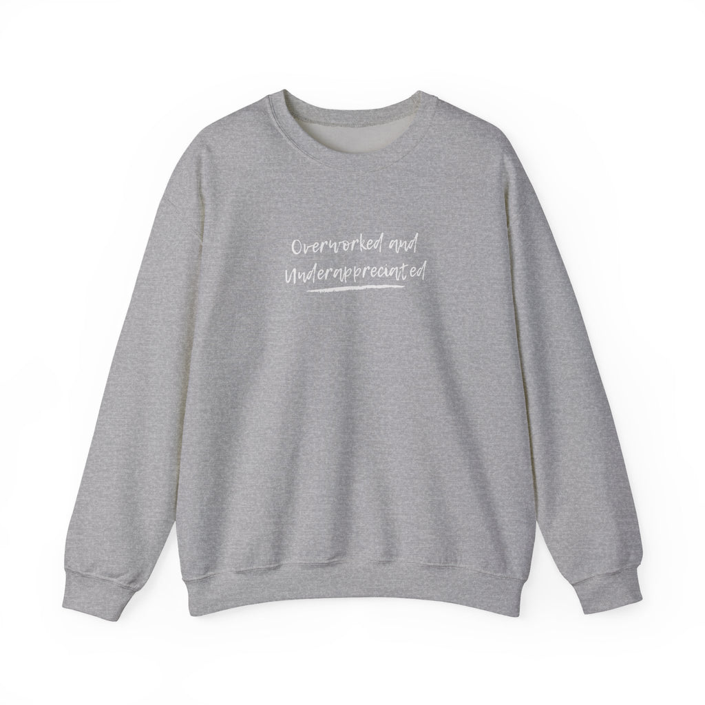 Gray sweatshirt with 'overworked and underappreciated' text on a white background