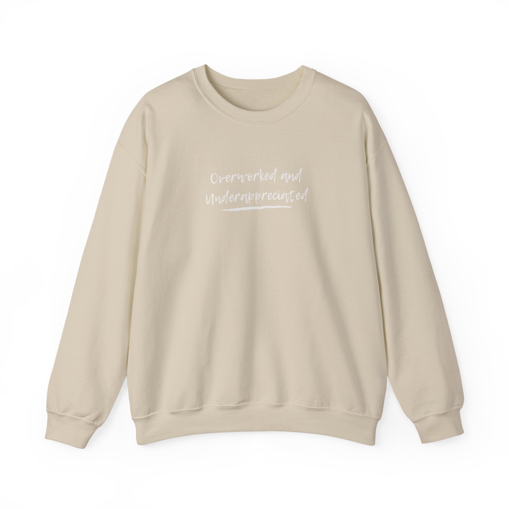 Beige sweatshirt with 'overworked and underappreciated' text on a white background