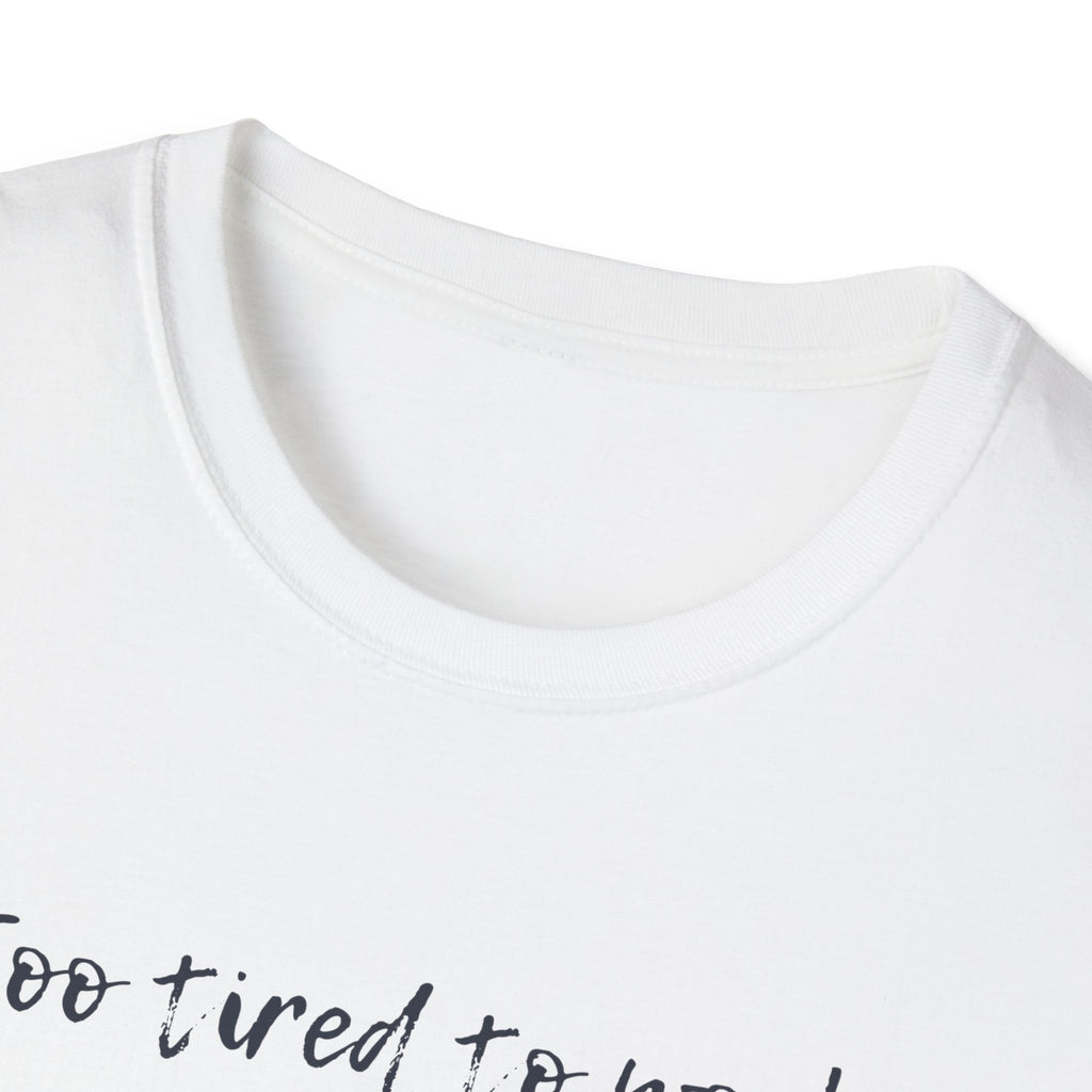 White t-shirt with 'too tired to' text on a white background