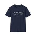 Black t-shirt with 'too tired to work, too young to retire' printed, on a white background